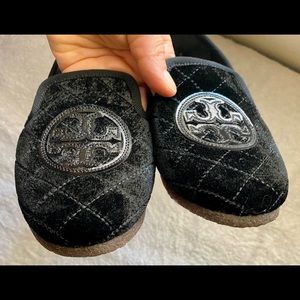Luxurious, black  loafers by Tory Burch made with lamb fur from Australia